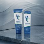 Orosteel Review 2026: A close-up shot of a person applying Orosteel cooling cream to a painful knee joint for instant relief.